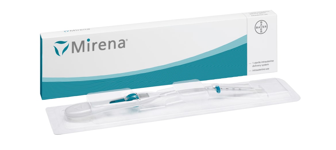 Mirena IUD and packaging Mirena IUD and packaging